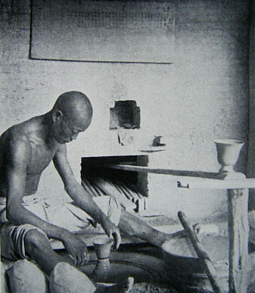 The potter at his wheel